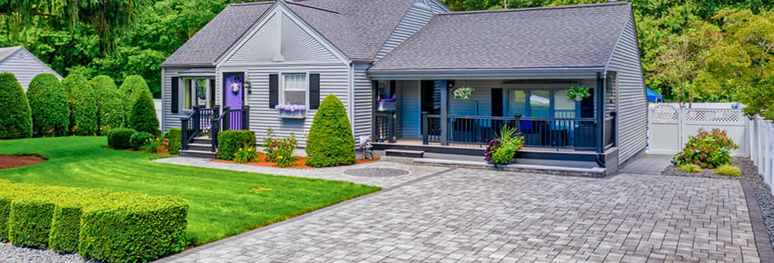 Beautiful driveway and landscaped yard